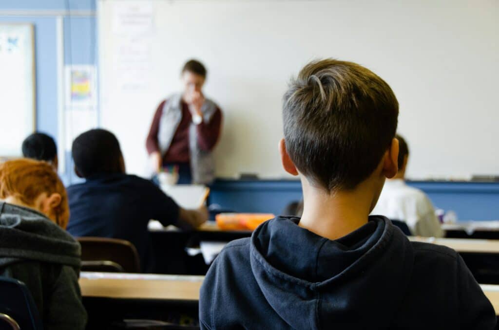 students sitting in a large classroom
