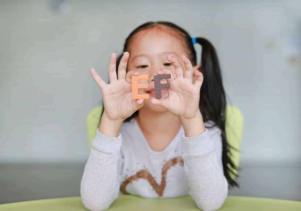 young girl with EF symbols