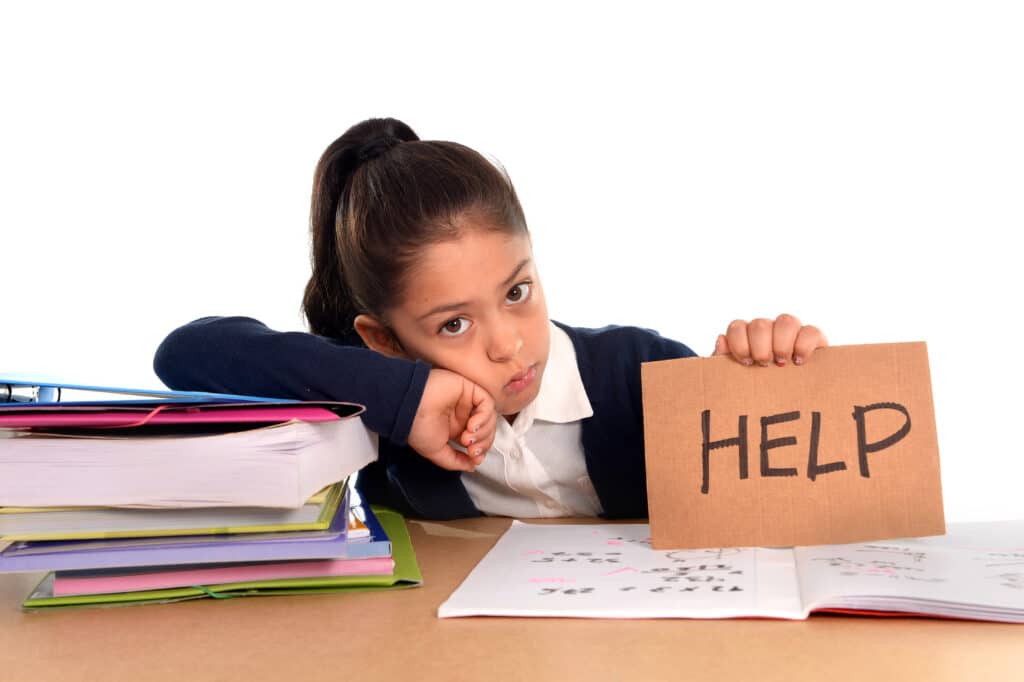 girl holding up homework help sign
