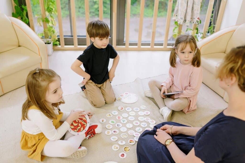 kids sitting in a circle playing
