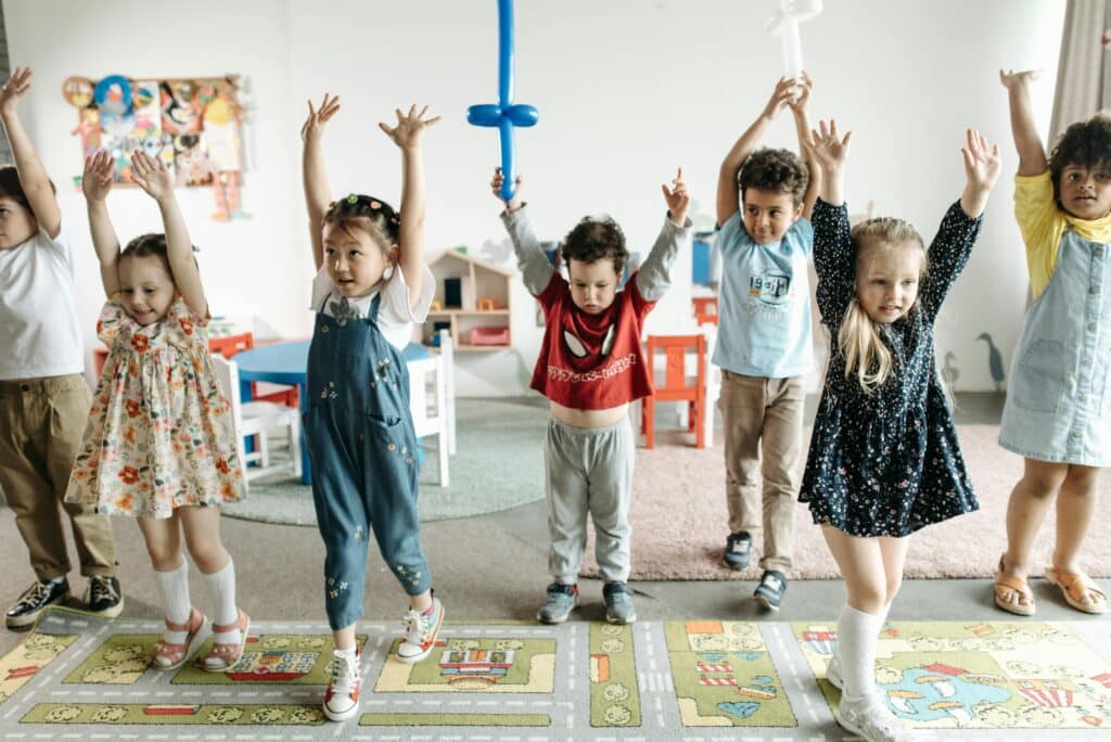 young kids playing in classroom