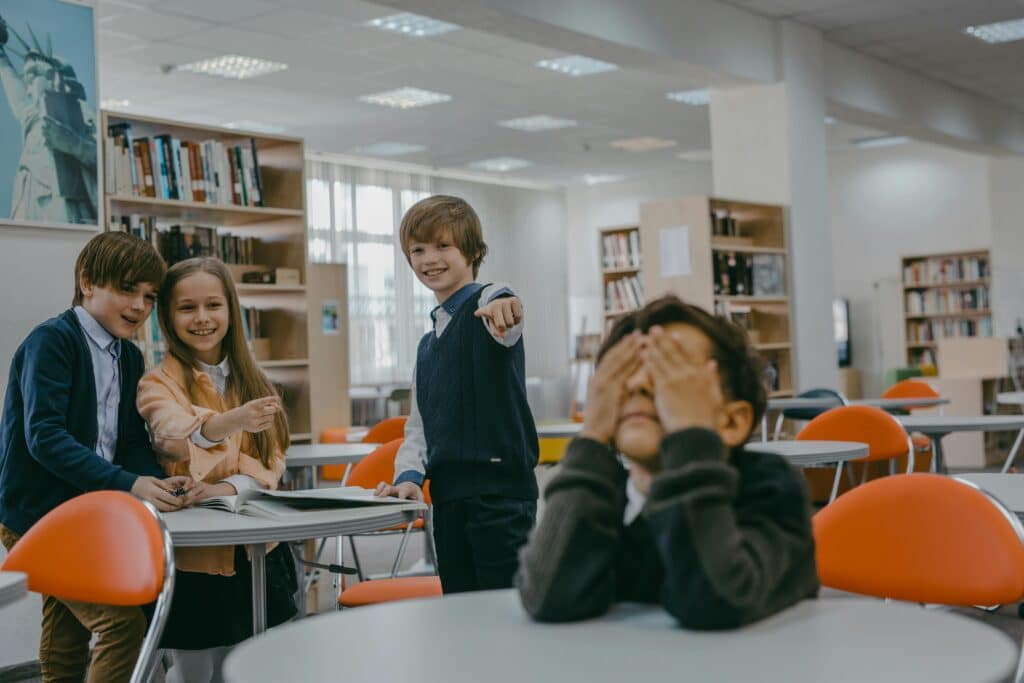 student goofing around in class